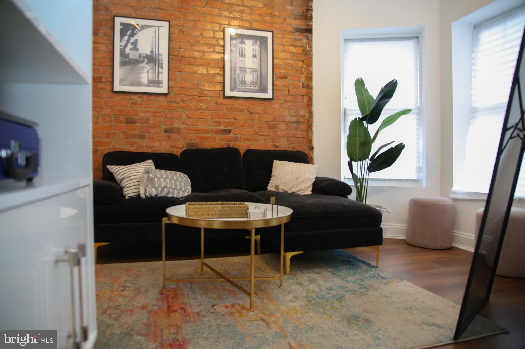 1345 1st Street Northwest, Unit 2 Washington, DC 20001 - Photo 8 of 11 Chic urban retreat with exposed brick charm.