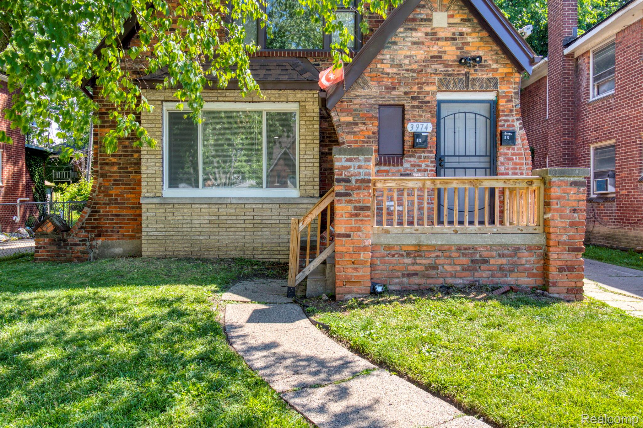 3974 Devonshire Road Detroit, MI 48224 - Photo 1 of 15 Brick exterior with contrasting brick accents and a gabled roofline