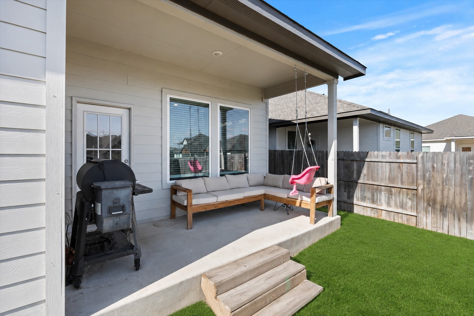 1027 Haystack New Braunfels, TX 78130 - Photo 15 of 15 An inviting covered patio offers a comfortable outdoor seating area, perfect for relaxed enjoyment.