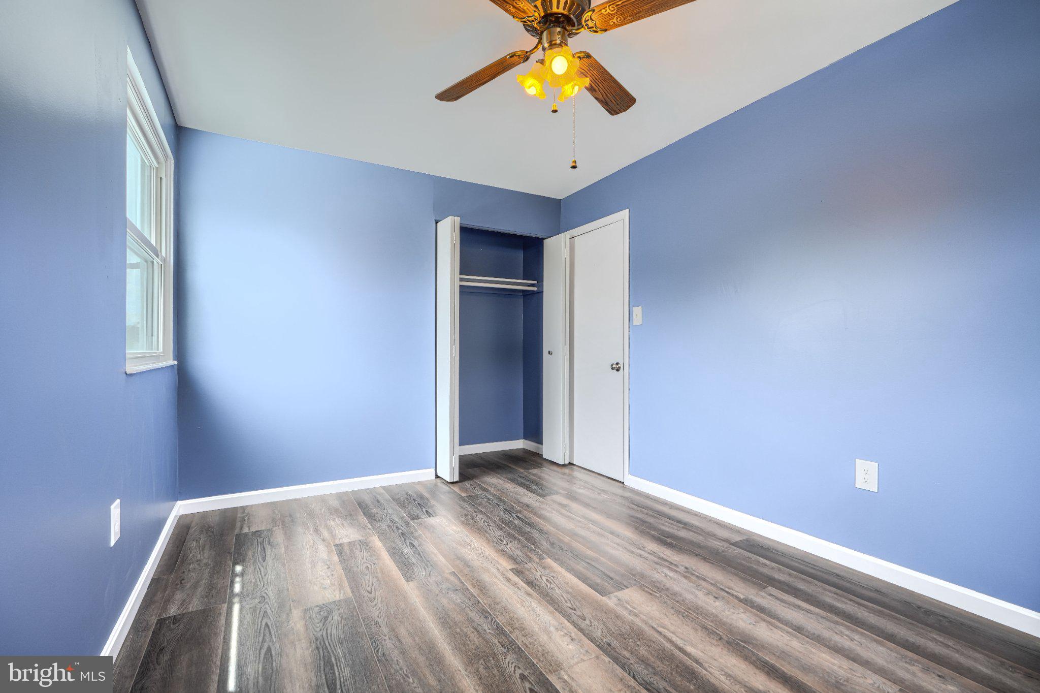 3910 Carthage Road Randallstown, MD 21133 - Photo 26 of 42 Bright blue room with modern charm.
