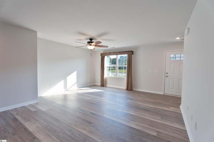 156 Queens Mill Court Pendleton, SC 29670 - Photo 4 of 18 This airy living space features abundant natural light and versatile flooring, creating an inviting atmosphere.