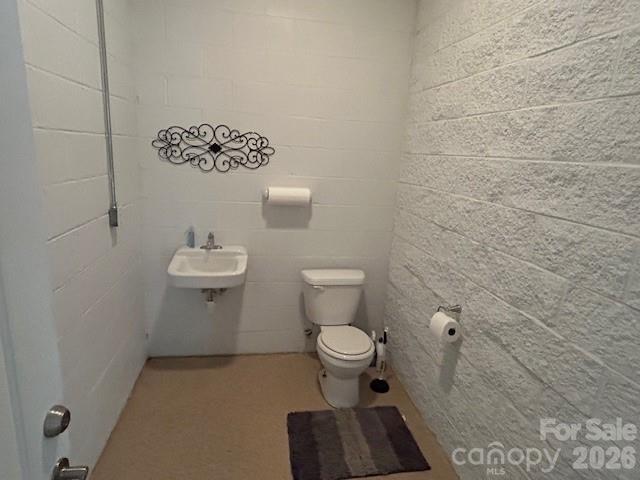 0 Palms Way Forest City, NC 28043 - Photo 14 of 22 a bathroom with a toilet and a sink
