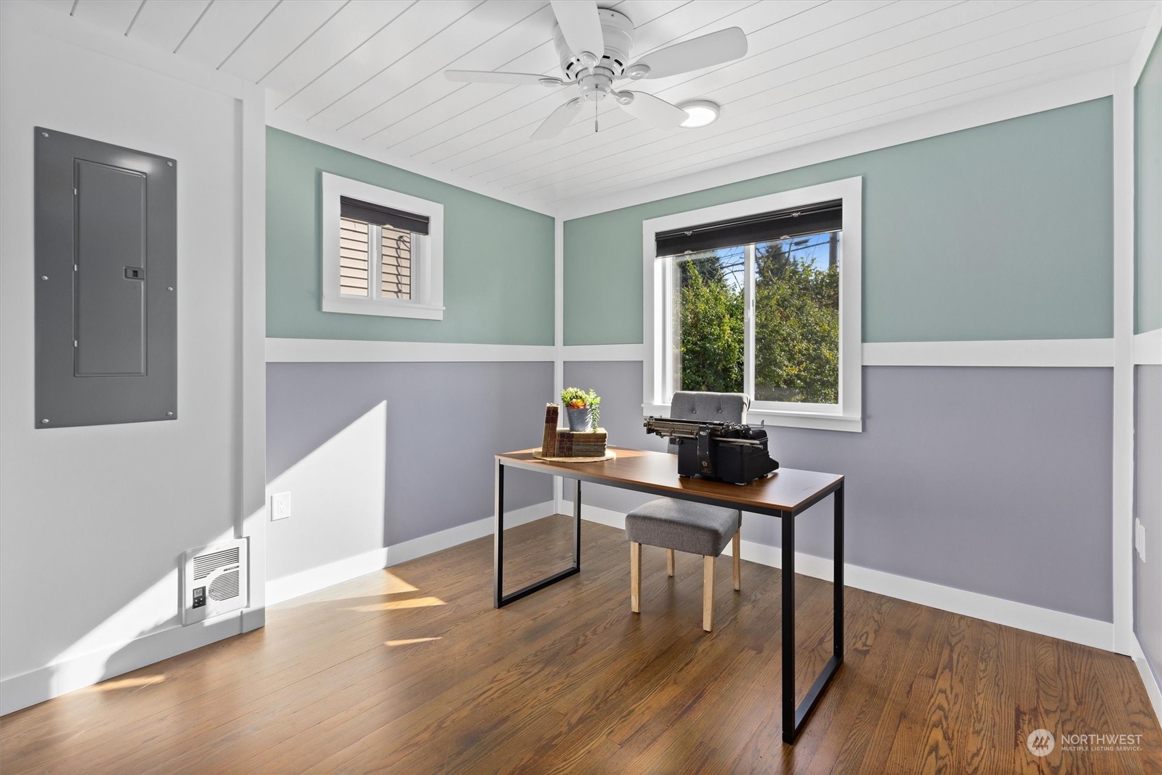 6202 Rockefeller Avenue Everett, WA 98203 - Photo 14 of 40 a view of a workspace with furniture and a window