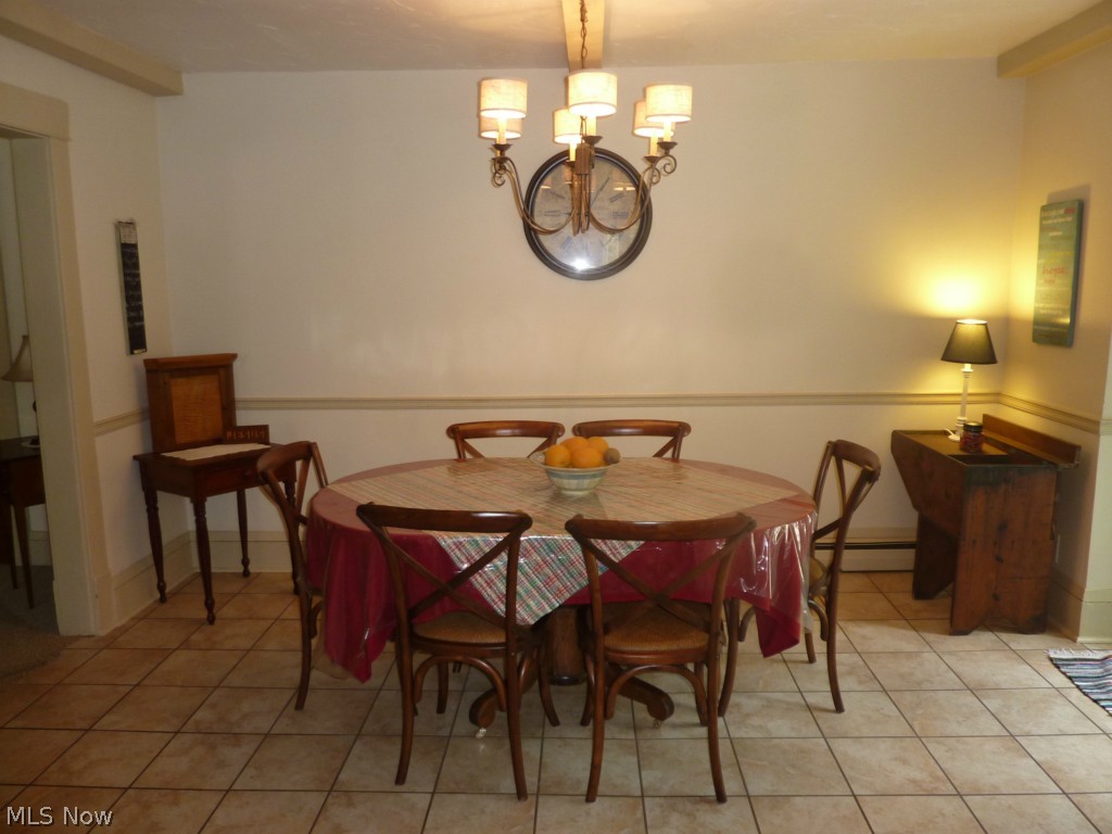 Formal or Informal Dining, Open to Kitchen, French Doors to Composite Decking, Ceramic Flooring from the Kitchen to the Dining Room ... Tastefully Decorated ...