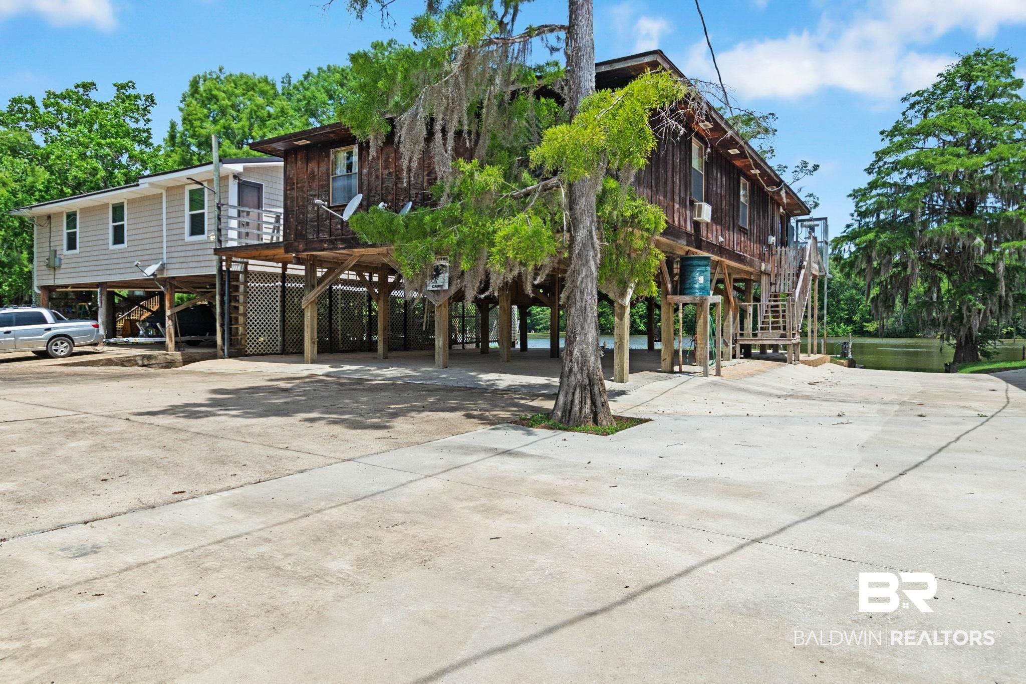 8153 Bryant's Lndg Road Stockton, AL 36579 - Photo 11 of 87 Waterfront property featuring two distinct elevated structures