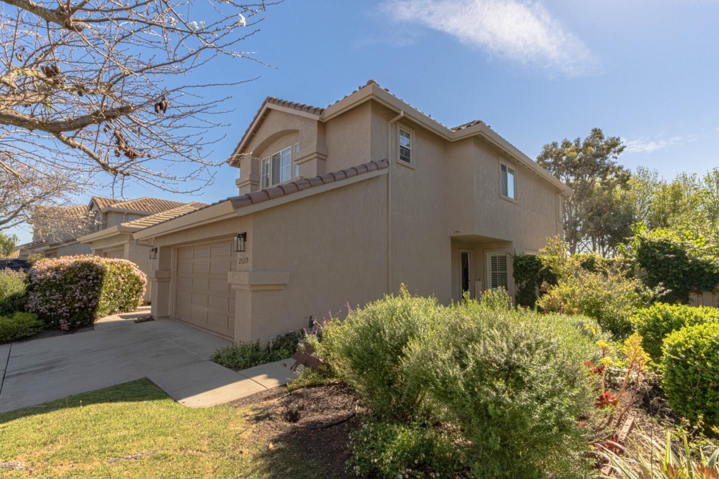 25215 Azalea Court Salinas, CA 93908 - Photo 2 of 48 a view of a house with a yard and plants