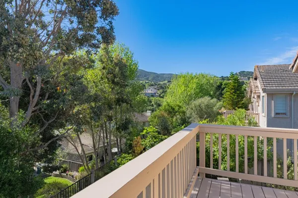 a view of a backyard with sitting area