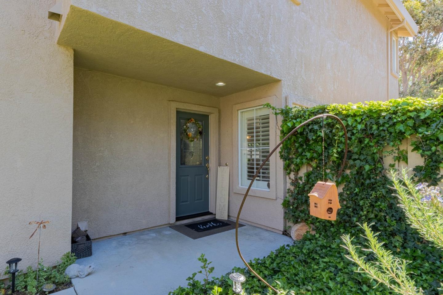 25215 Azalea Court Salinas, CA 93908 - Photo 3 of 48 a front view of a house with a yard