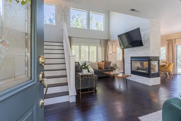 a living room with furniture or fireplace and a flat screen tv