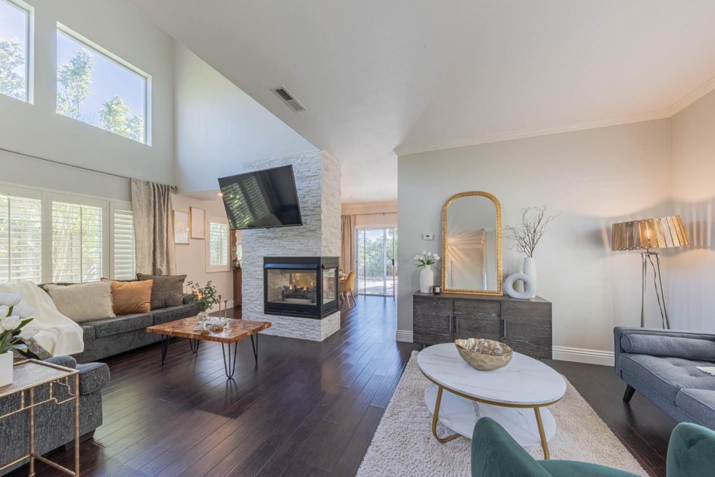 25215 Azalea Court Salinas, CA 93908 - Photo 6 of 48 a living room with fireplace furniture and a wooden floor