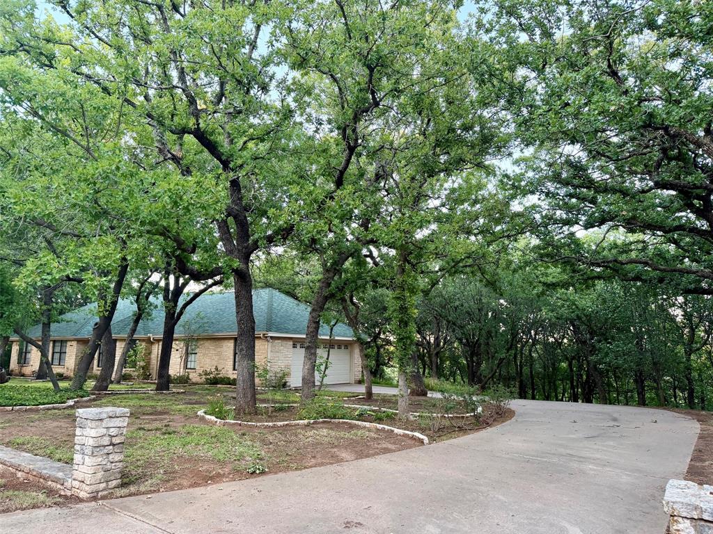 150 Timberidge Lake Road Graham, TX 76450 - Photo 3 of 25 a view of street with trees