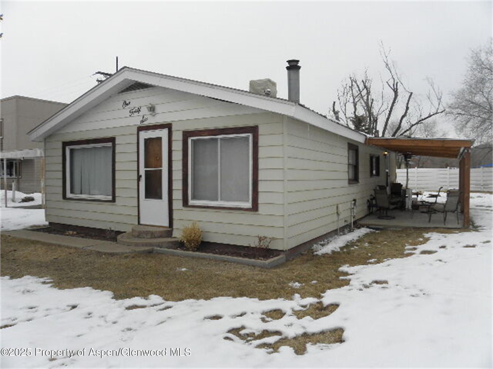 146 East 12th Street Rifle, CO 81650 - Photo 1 of 1 a front view of a house