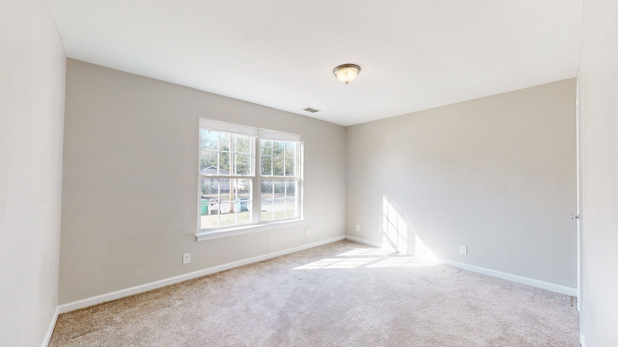 253 Warrior Road Madison, TN 37115 - Photo 15 of 43 an empty room with a window