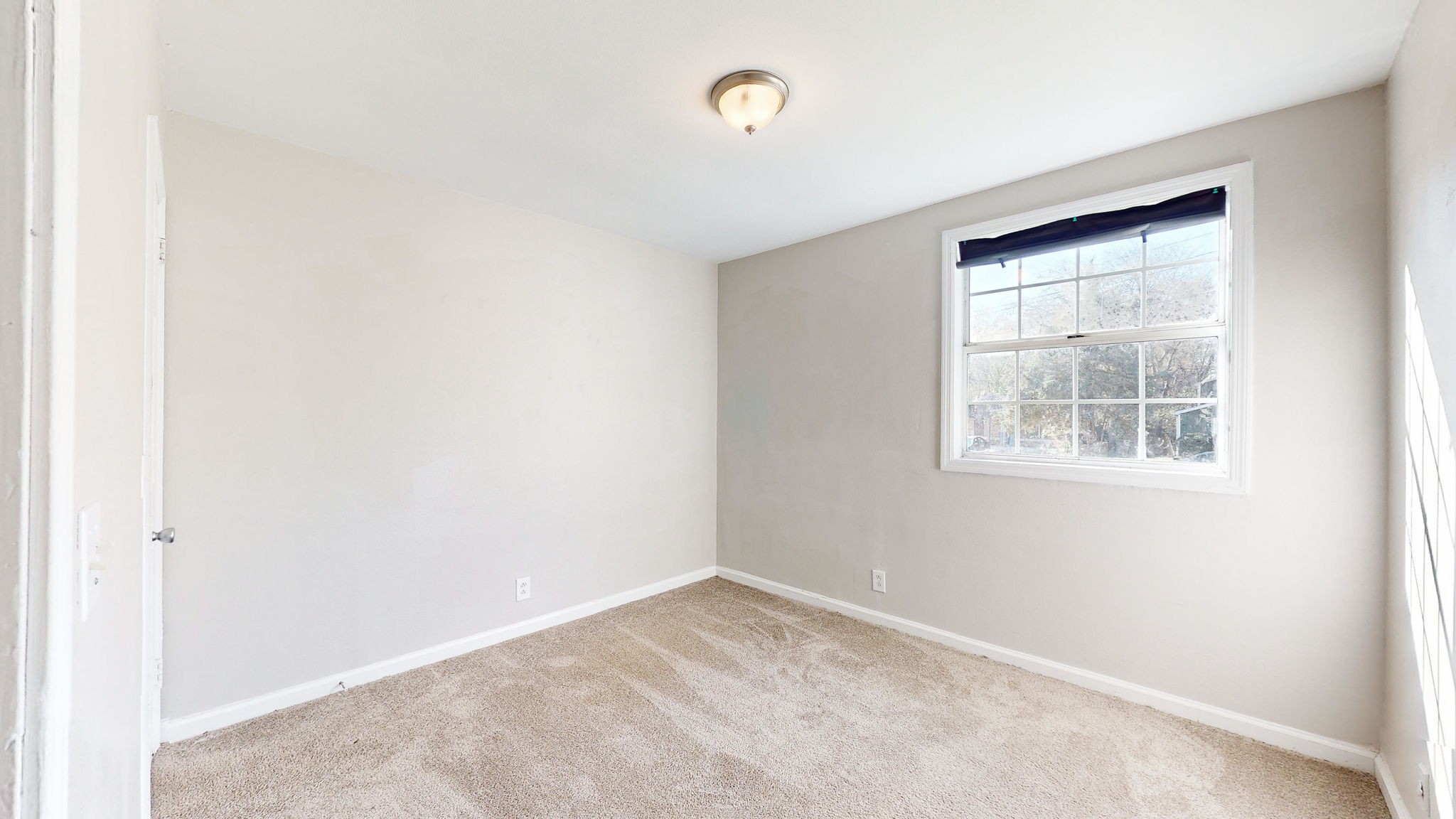 253 Warrior Road Madison, TN 37115 - Photo 21 of 43 an empty room with a window