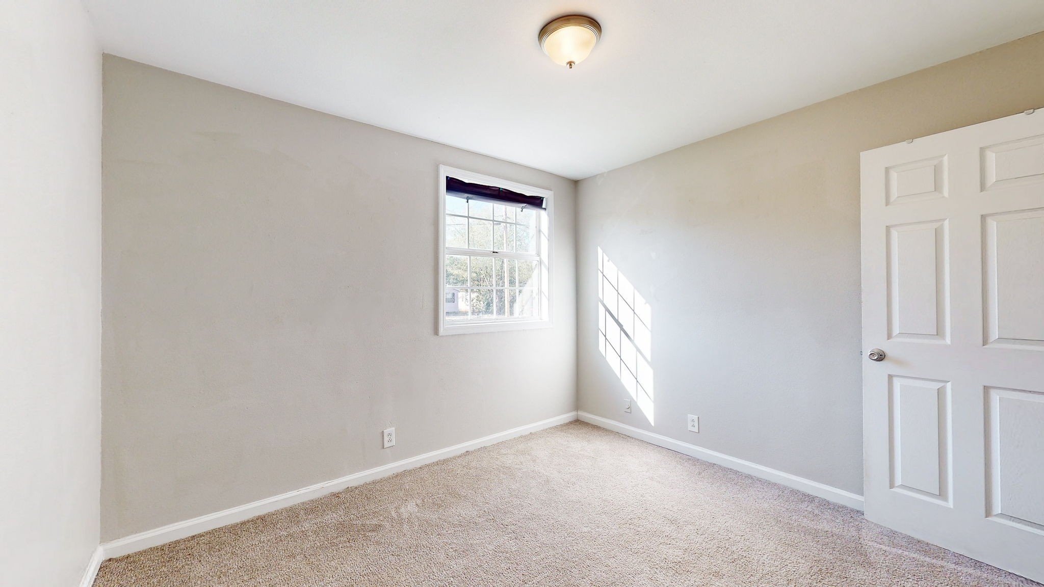 253 Warrior Road Madison, TN 37115 - Photo 22 of 43 an empty room with windows