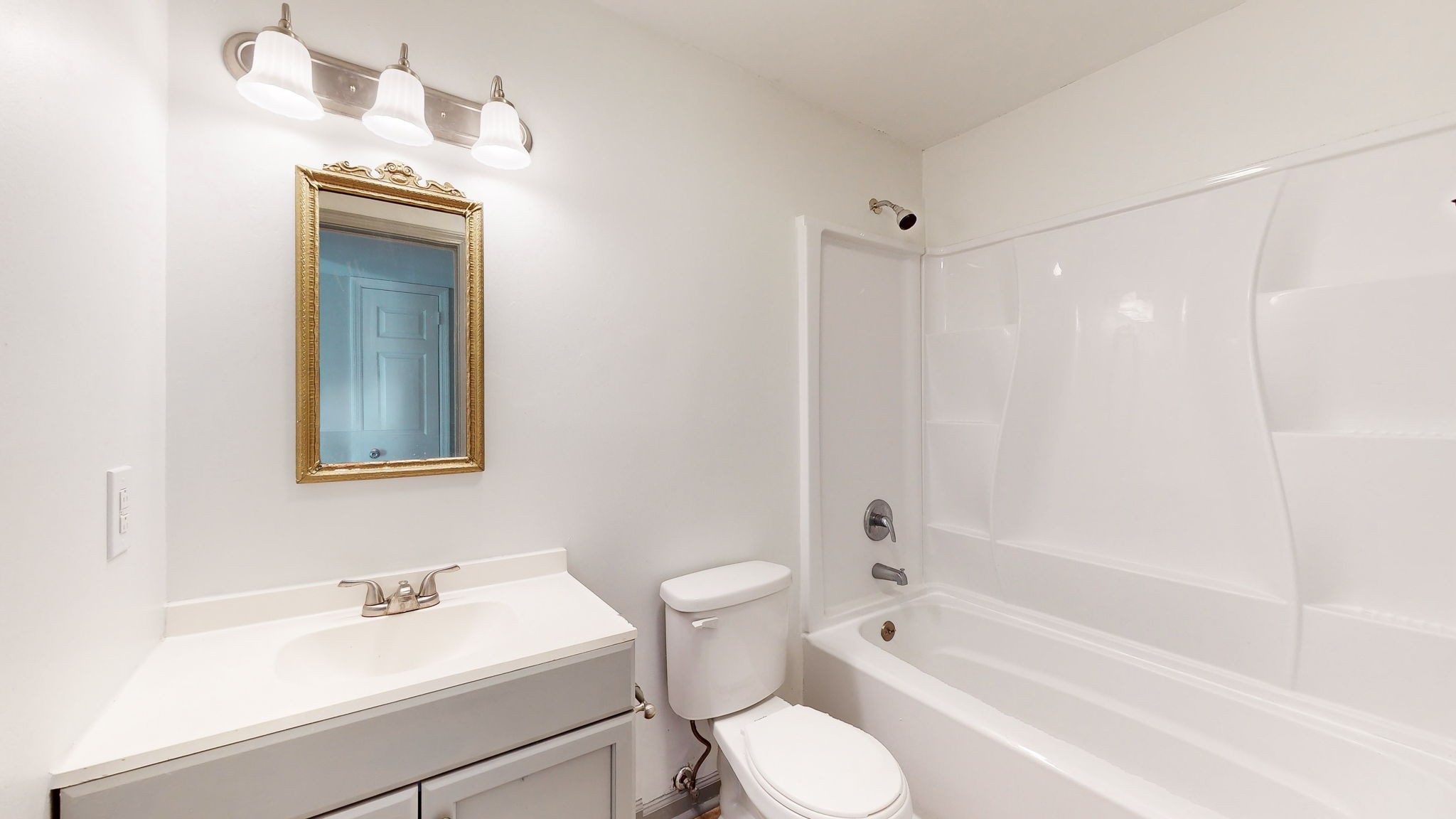 253 Warrior Road Madison, TN 37115 - Photo 24 of 43 a bathroom with a sink a toilet and shower