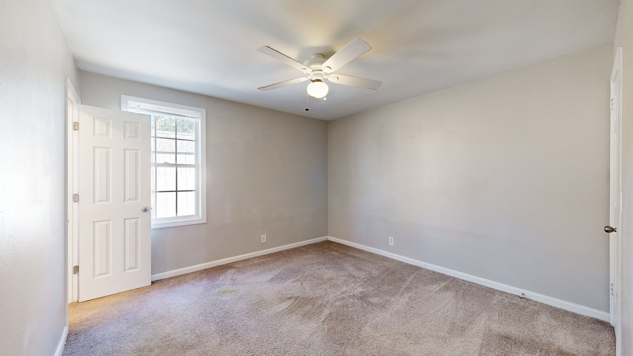 253 Warrior Road Madison, TN 37115 - Photo 25 of 43 wooden floor in an empty room with a window