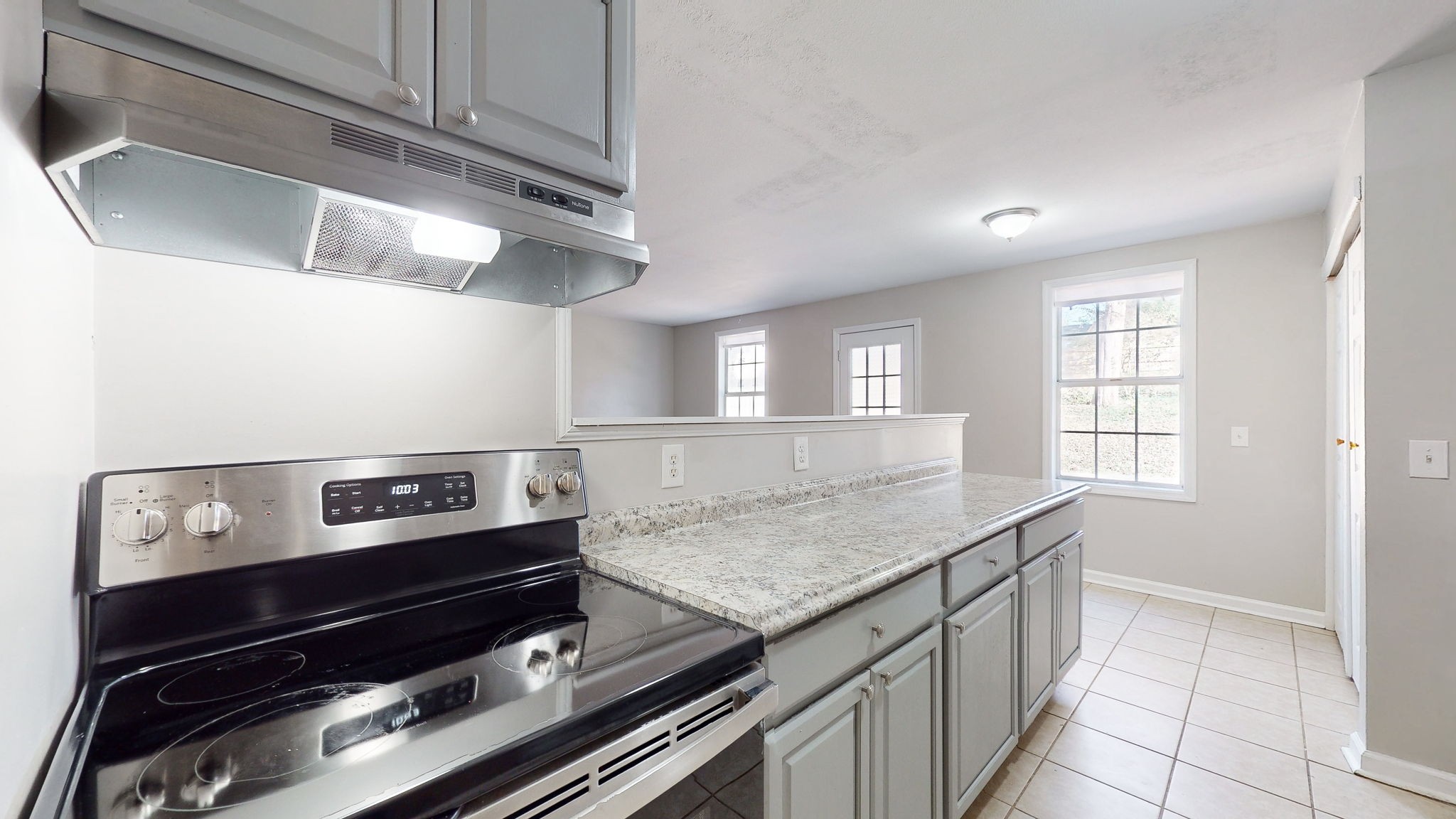 253 Warrior Road Madison, TN 37115 - Photo 4 of 43 a kitchen with a stove and a sink