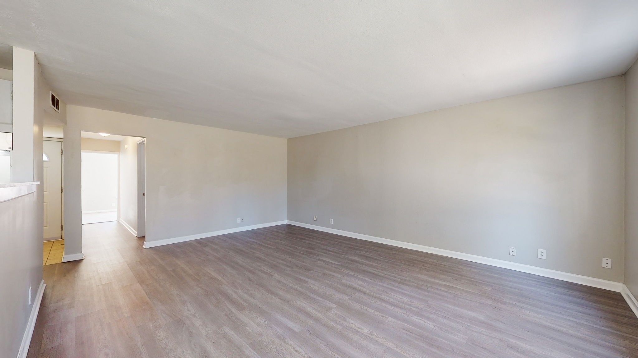 253 Warrior Road Madison, TN 37115 - Photo 9 of 43 a view of an empty room and wooden floor