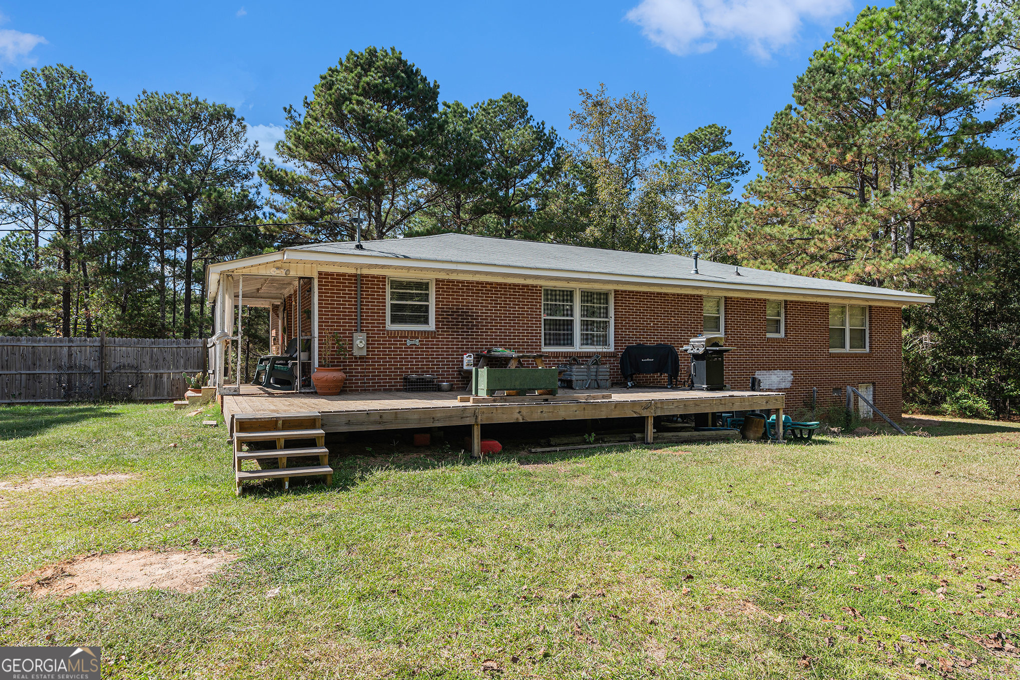 292 Musella Road Musella, GA 31066 - Photo 26 of 29 a view of a house with a backyard