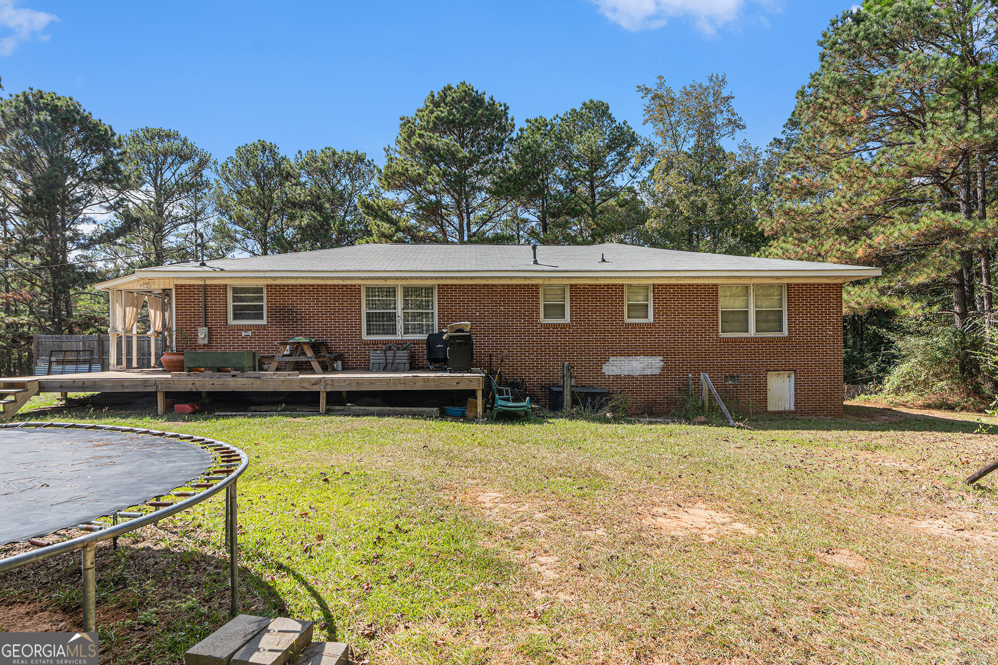 292 Musella Road Musella, GA 31066 - Photo 28 of 29 a view of a house with pool and a yard