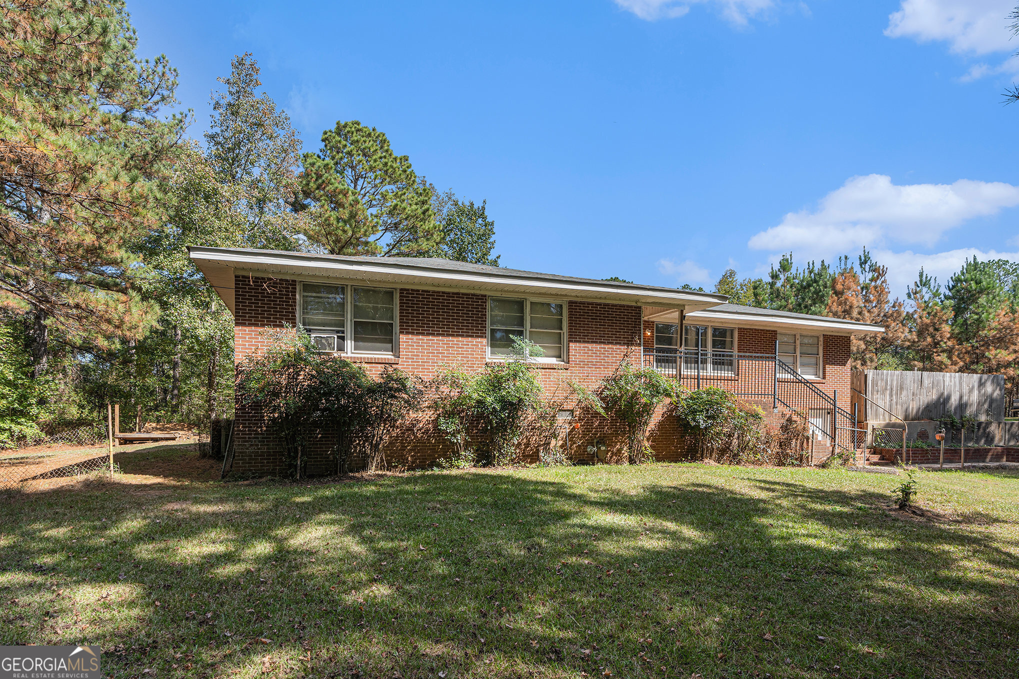 292 Musella Road Musella, GA 31066 - Photo 6 of 29 a front view of house with yard and green space