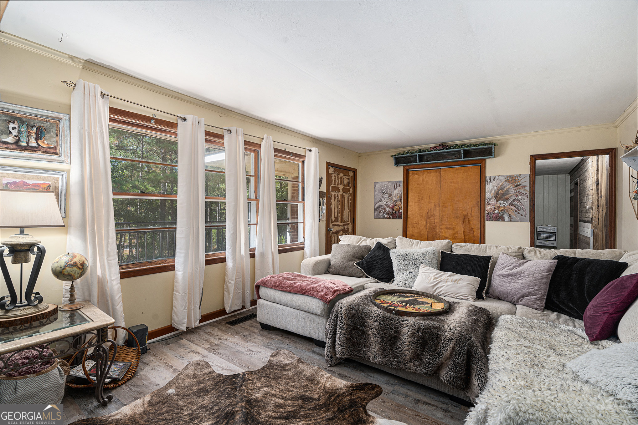 292 Musella Road Musella, GA 31066 - Photo 10 of 29 a living room with furniture and a window