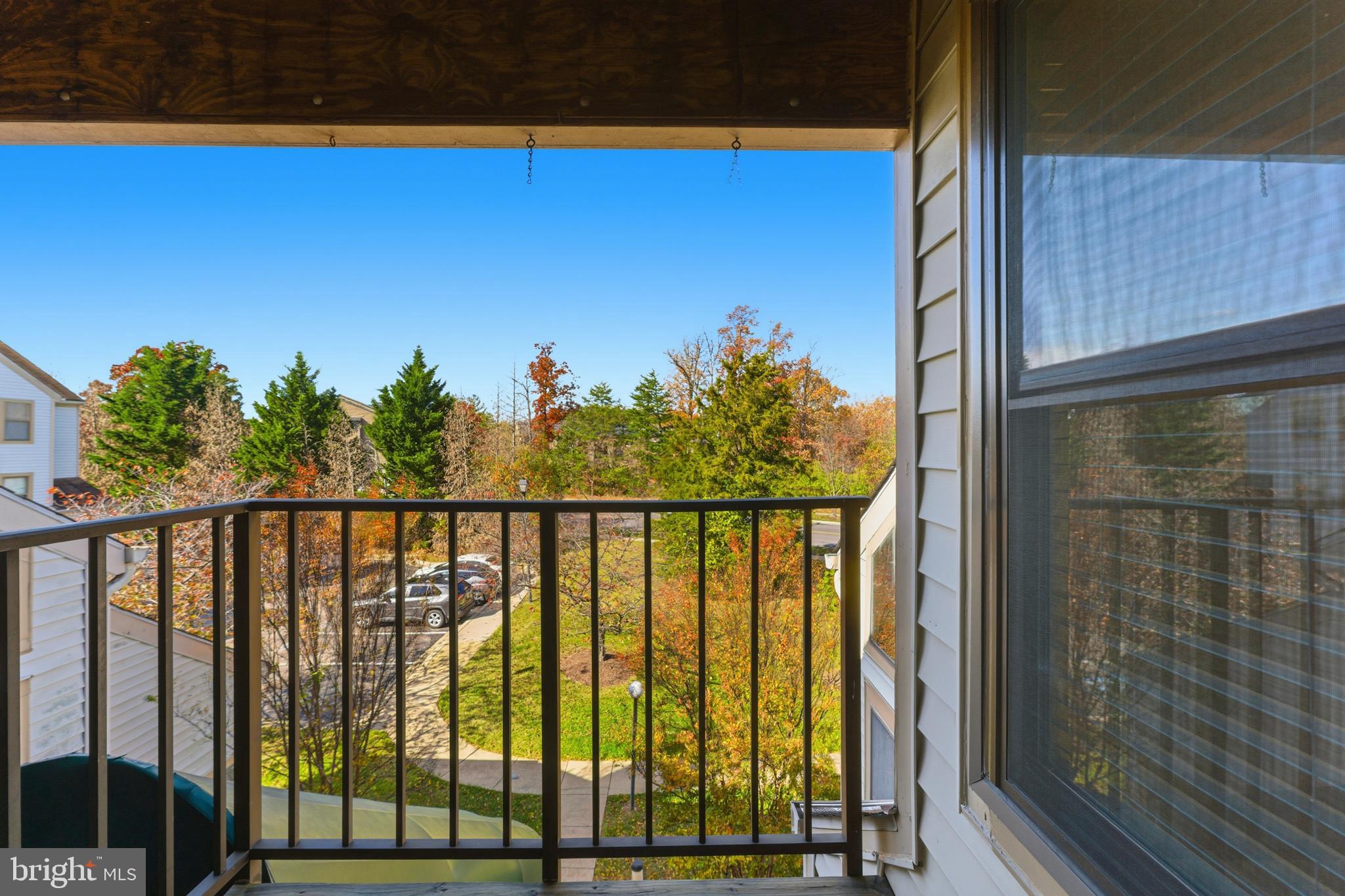 13406 Shady Knoll Drive, Unit 305 Silver Spring, MD 20904 - Photo 24 of 37 a view of a balcony with outdoor space