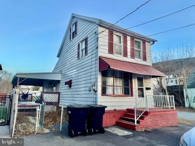 a front view of a house with a balcony
