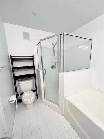 a bathroom with a sink and a shower