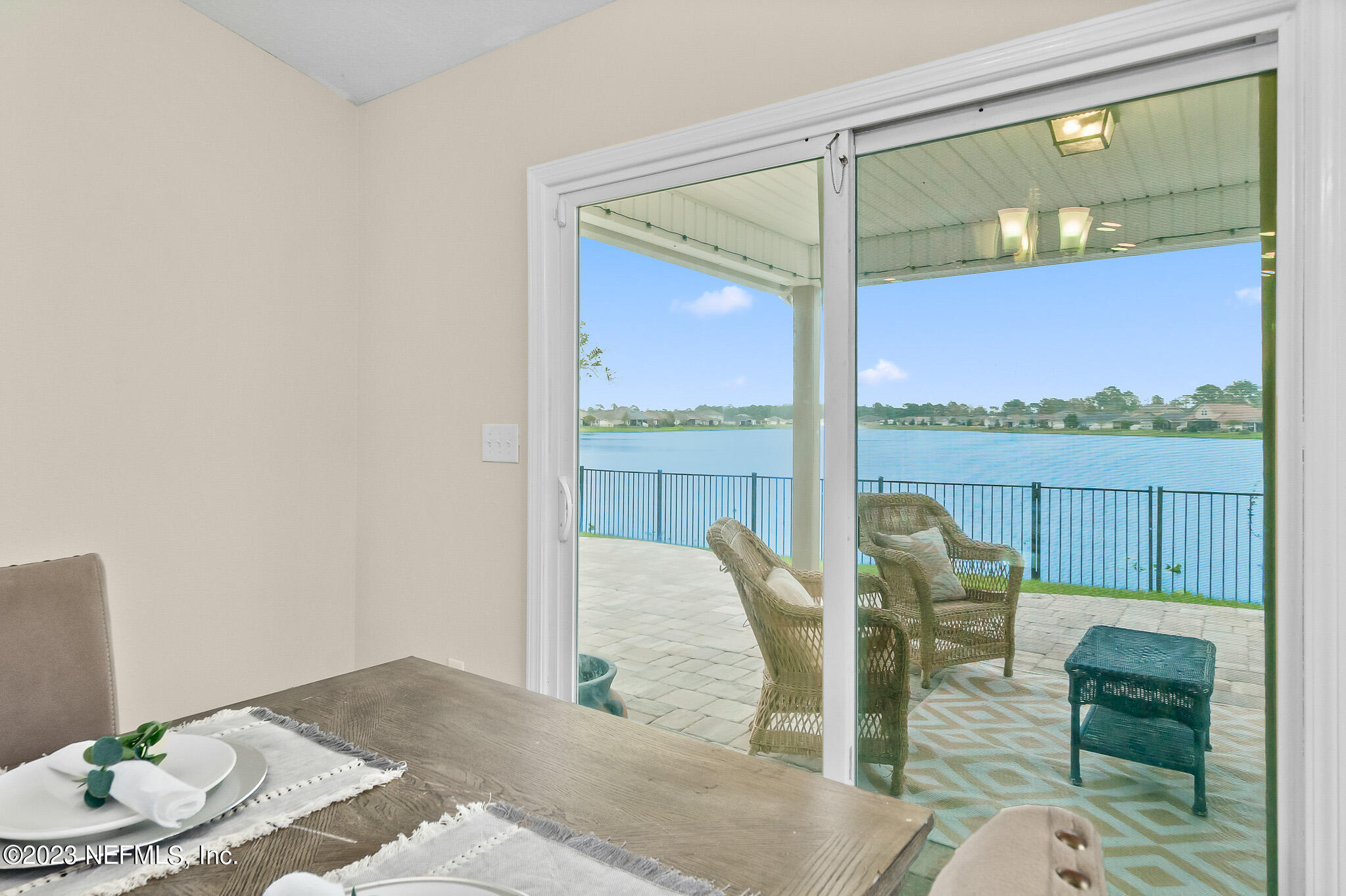 598 Deer Crossing Road St. Augustine, FL 32086 - Photo 14 of 33 a bedroom with furniture and a window