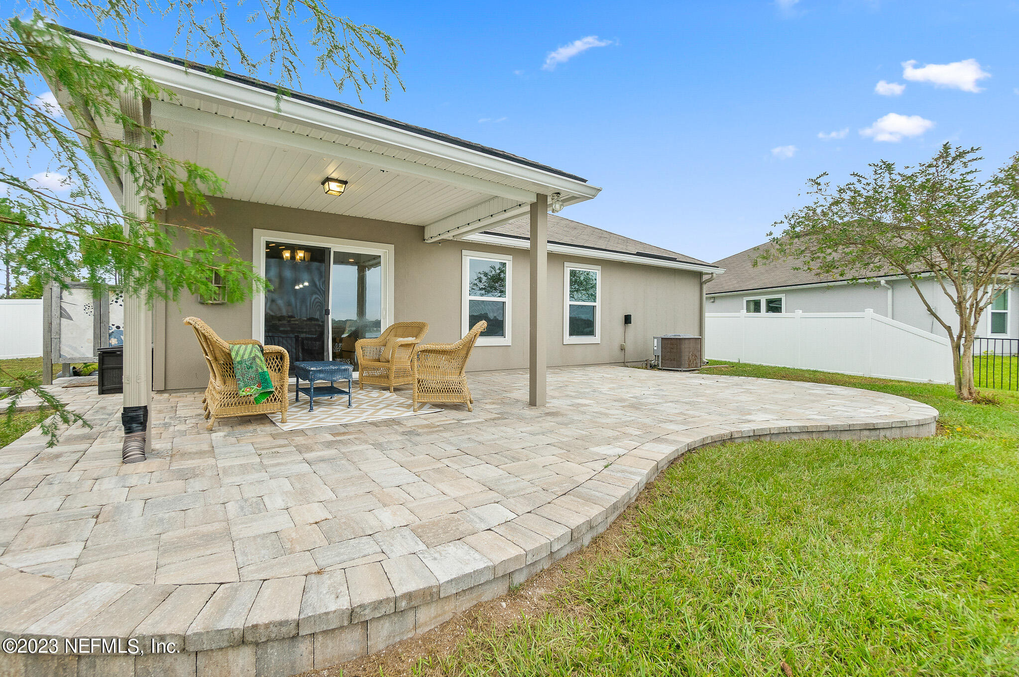 598 Deer Crossing Road St. Augustine, FL 32086 - Photo 29 of 33 a view of a house with backyard and sitting area