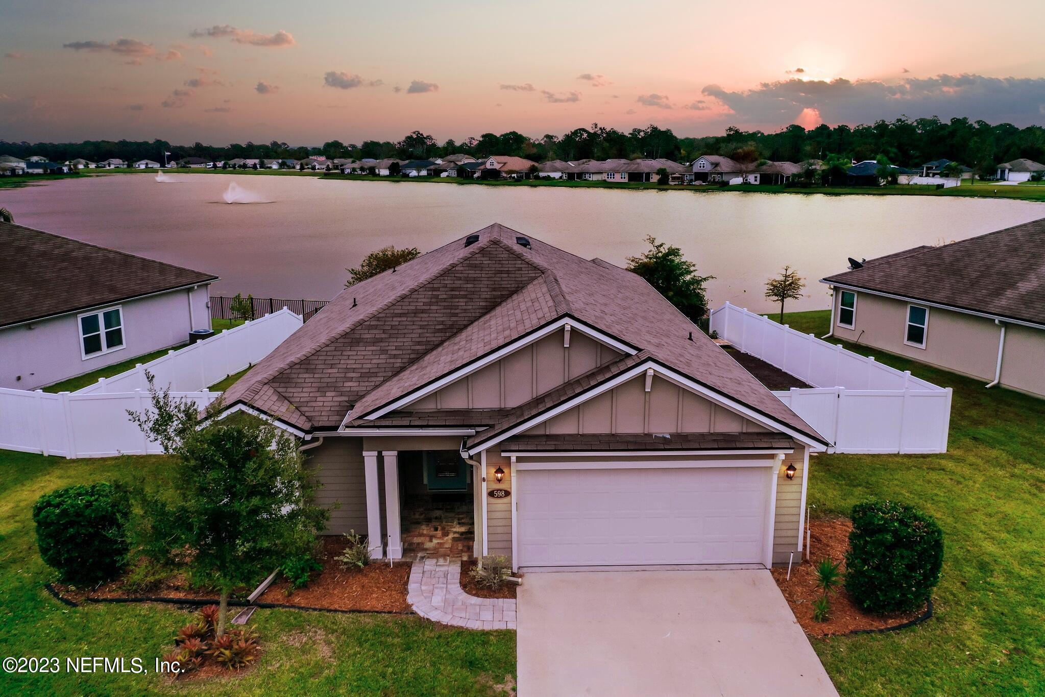 598 Deer Crossing Road St. Augustine, FL 32086 - Photo 33 of 33 a view of a house with a lake view