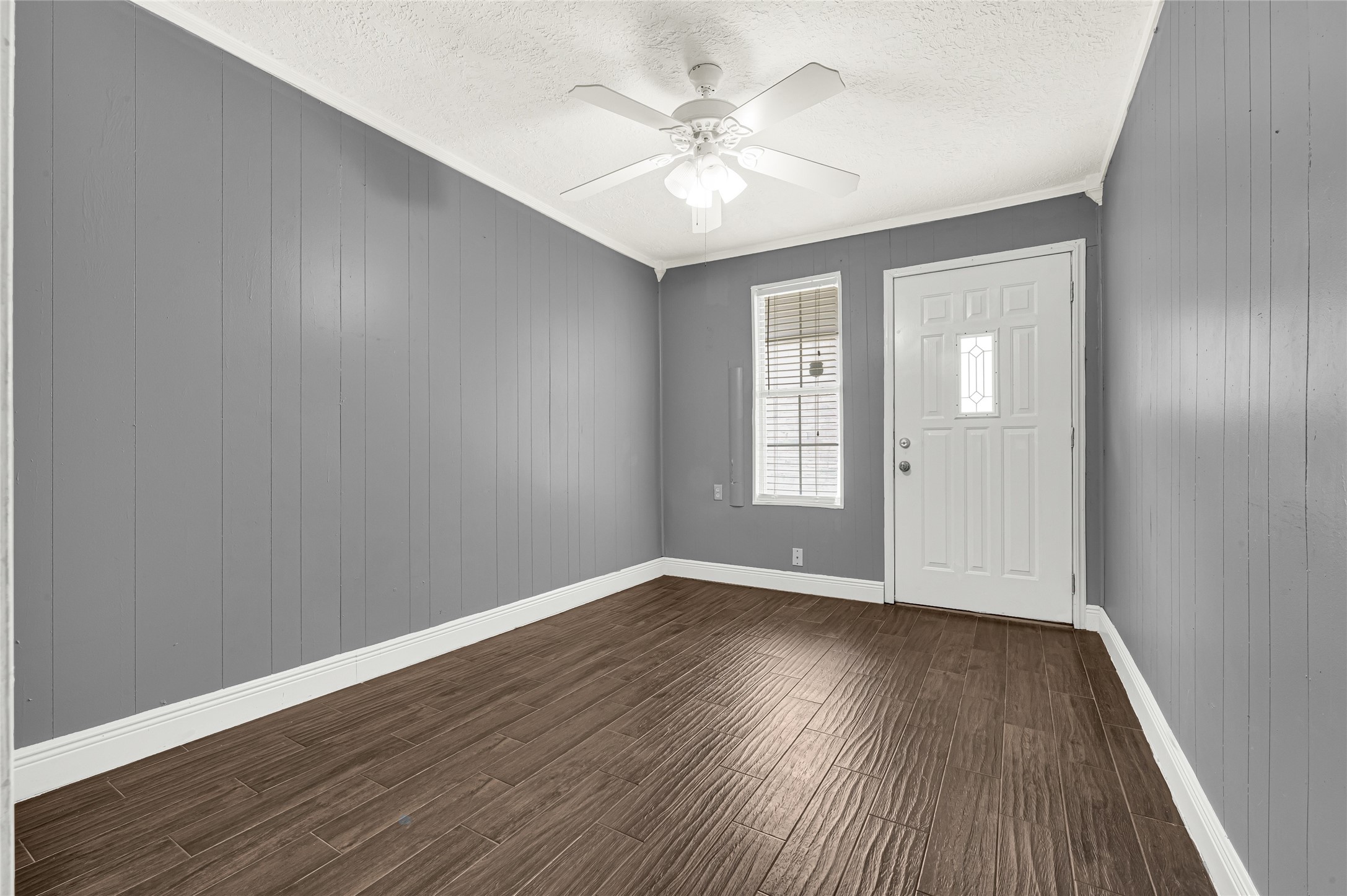 4170 Amir Street Houston, TX 77072 - Photo 9 of 18 wooden floor in an empty room with a window