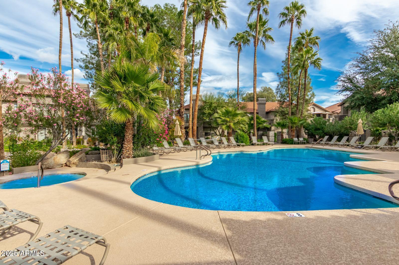 10015 East Mountain View Road, Unit 2017 Scottsdale, AZ 85258 - Photo 42 of 45 a view of a swimming pool with a patio