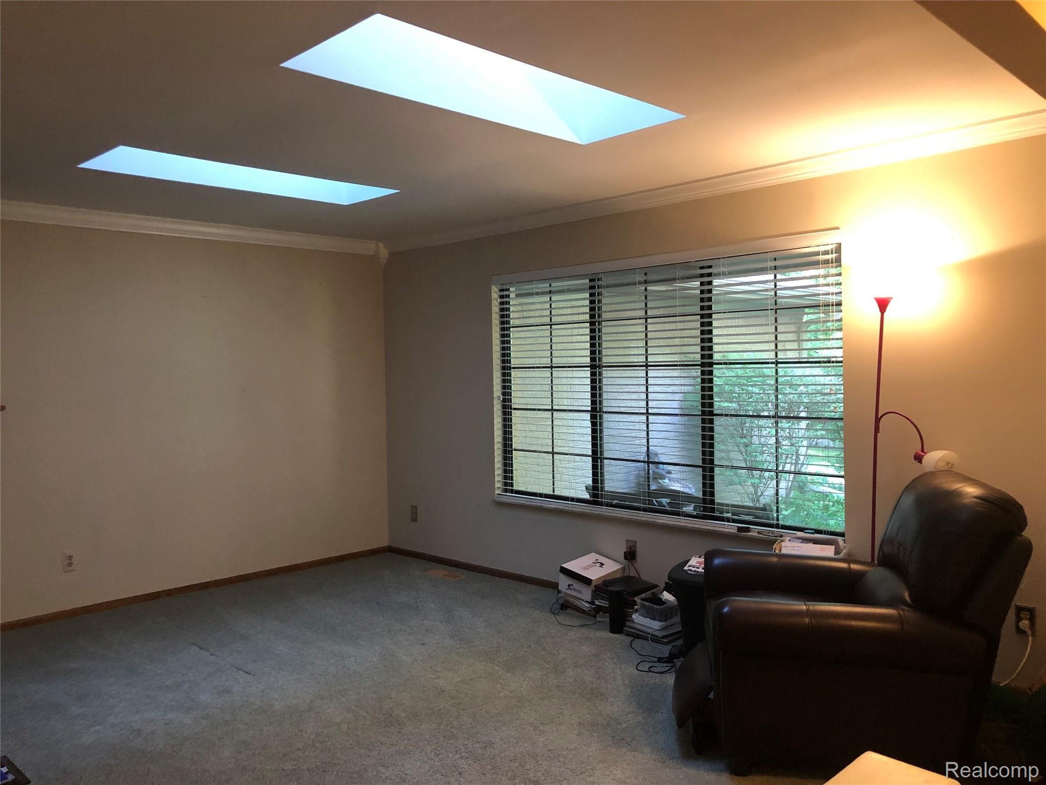 1750 Brewer Road Leonard, MI 48367 - Photo 24 of 67 Brewer living room .jpg
