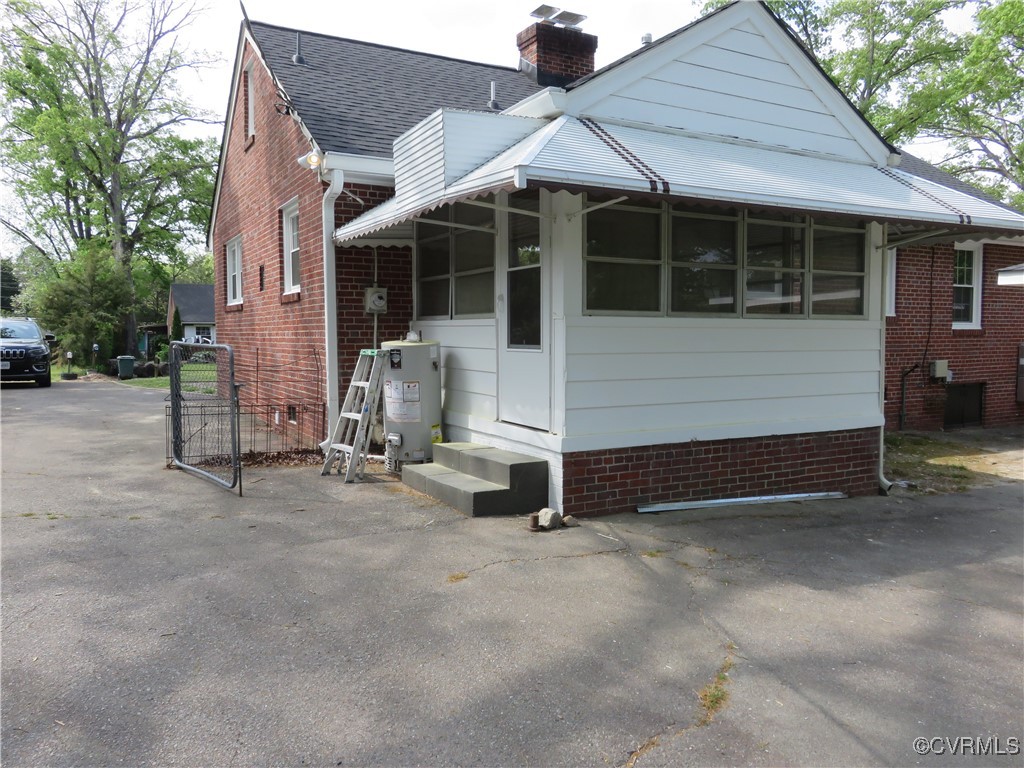 8708 Mapleton Road Henrico, VA 23229 - Photo 22 of 28 a view of house with a outdoor space