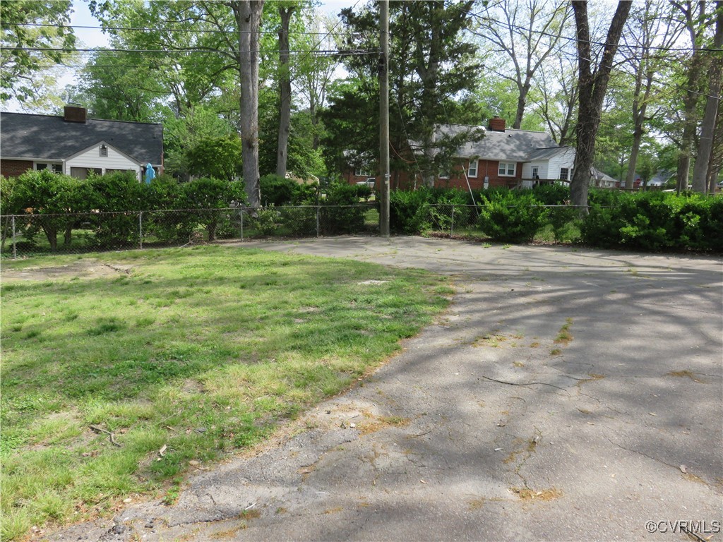 8708 Mapleton Road Henrico, VA 23229 - Photo 28 of 28 a view of a yard with a tree