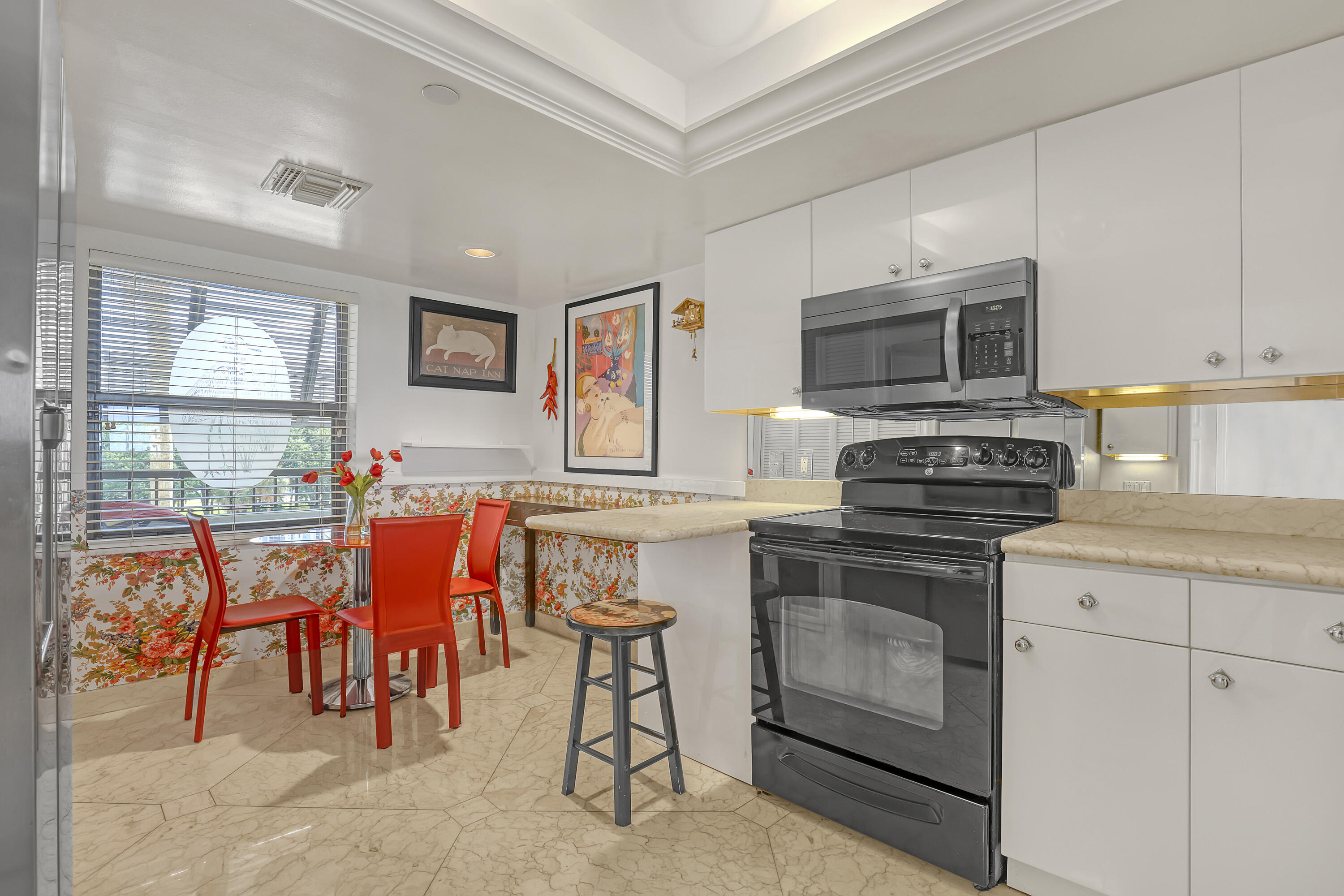 356 Golfview Road, Unit 403 North Palm Beach, FL 33408 - Photo 8 of 25 Kitchen & Sunny Breakfast Nook