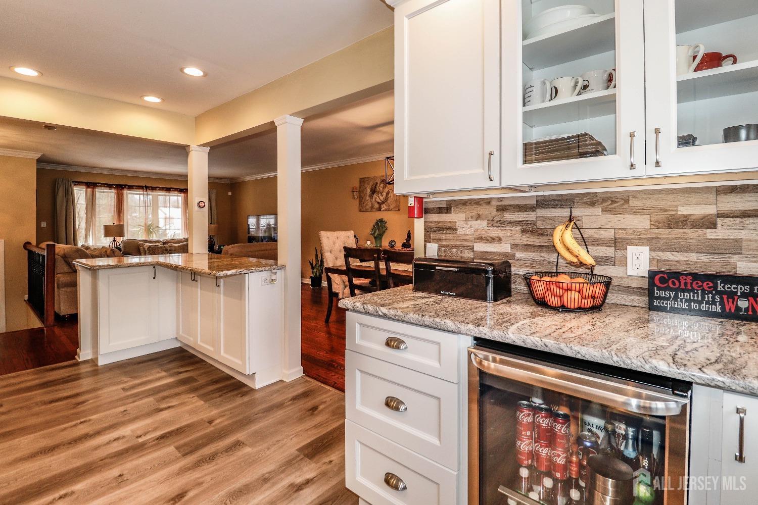 161 Devon Road Colonia, NJ 07067 - Photo 14 of 34 a kitchen with granite countertop a sink and cabinets
