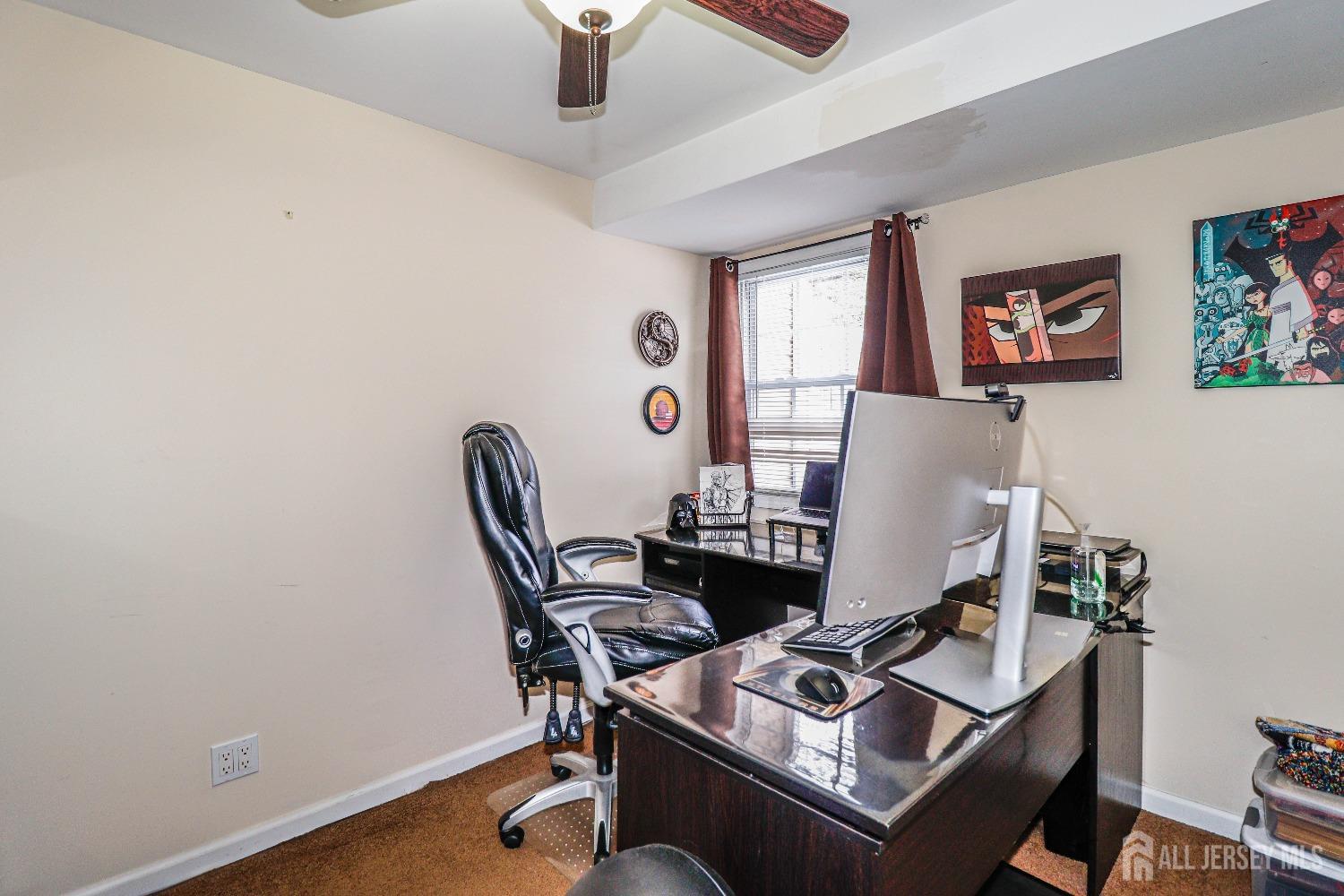 161 Devon Road Colonia, NJ 07067 - Photo 17 of 34 a workspace with furniture and lamp