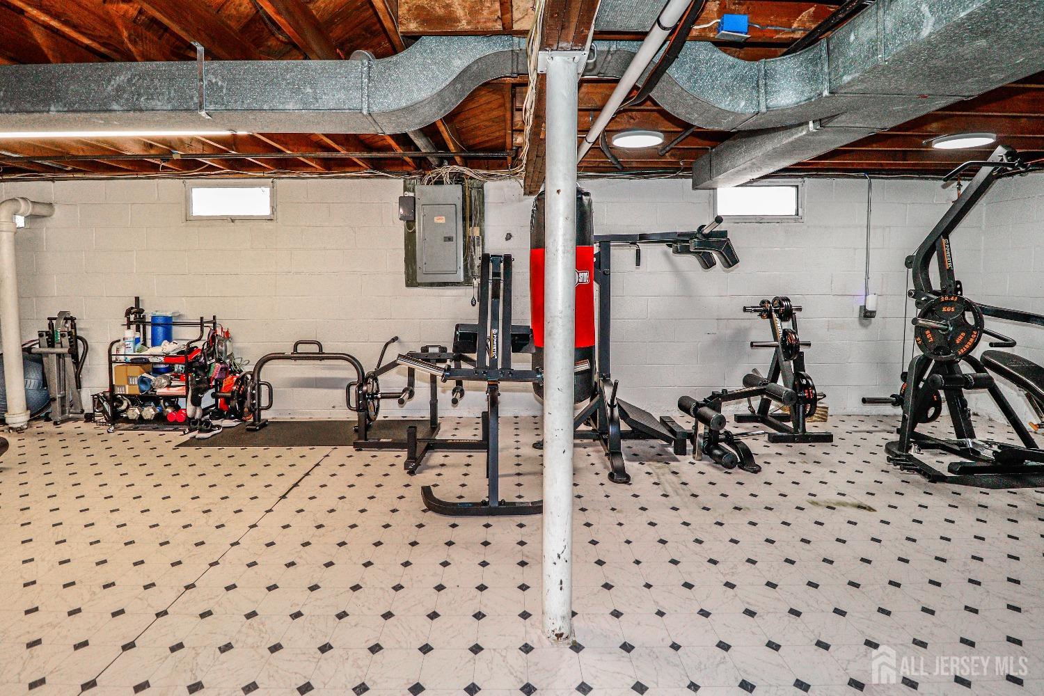 161 Devon Road Colonia, NJ 07067 - Photo 28 of 34 a view of a room with gym equipment