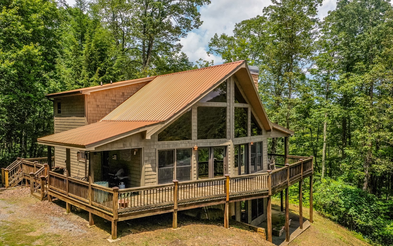 188 Bears Den Mountain Road Cherry Log, GA 30522 - Photo 1 of 1 a view of house with a yard and balcony