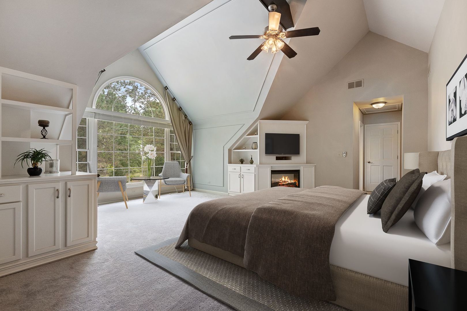 1540 West Wiesbrook Road Wheaton, IL 60189 - Photo 22 of 36 a spacious bedroom with a large bed and a large window