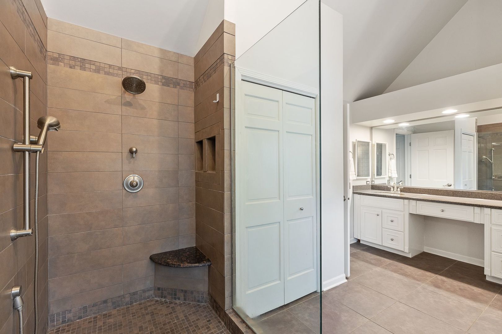 1540 West Wiesbrook Road Wheaton, IL 60189 - Photo 25 of 36 a bathroom with a granite countertop sink a toilet and shower