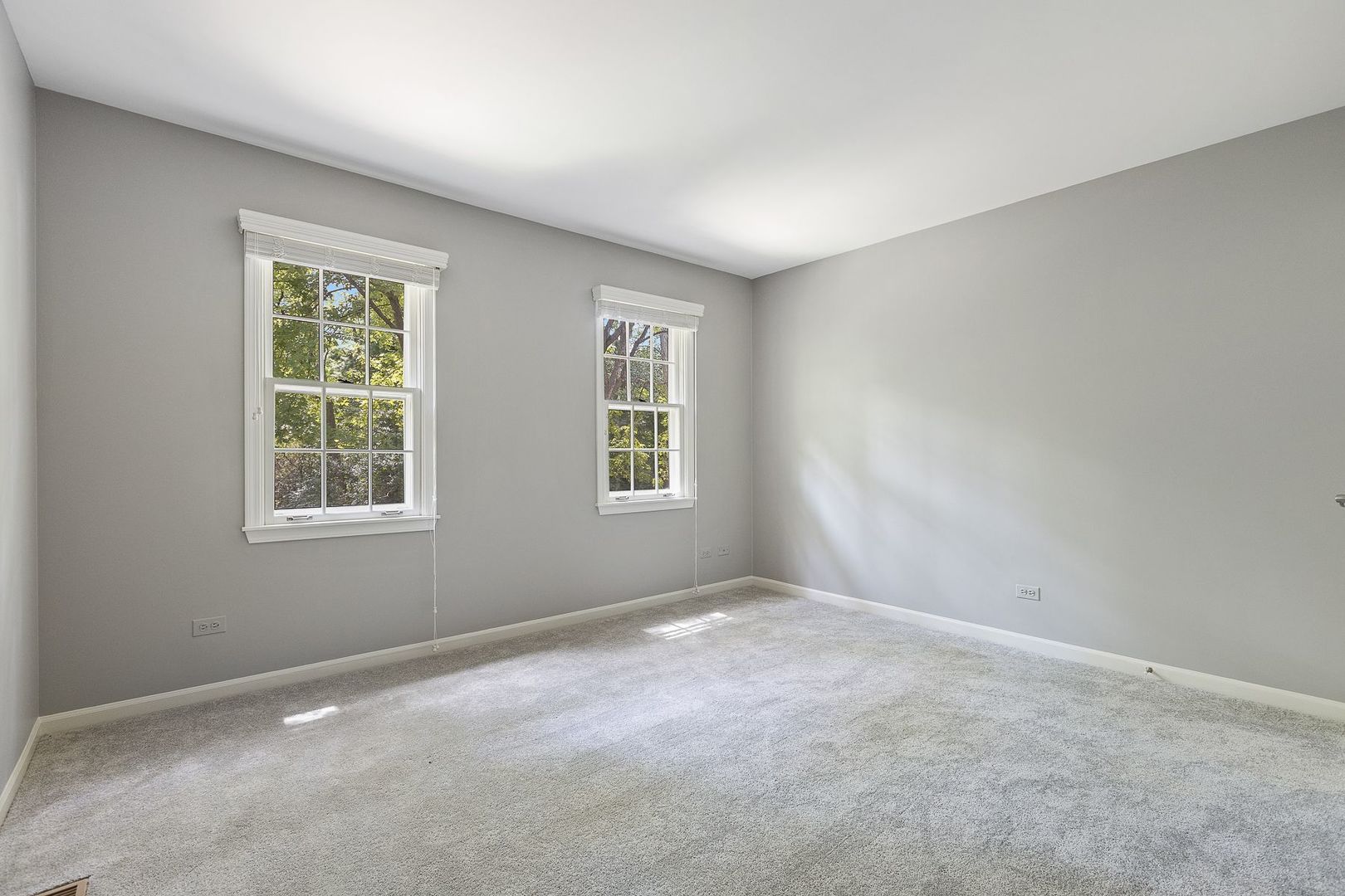 1540 West Wiesbrook Road Wheaton, IL 60189 - Photo 28 of 36 a view of an empty room with a window