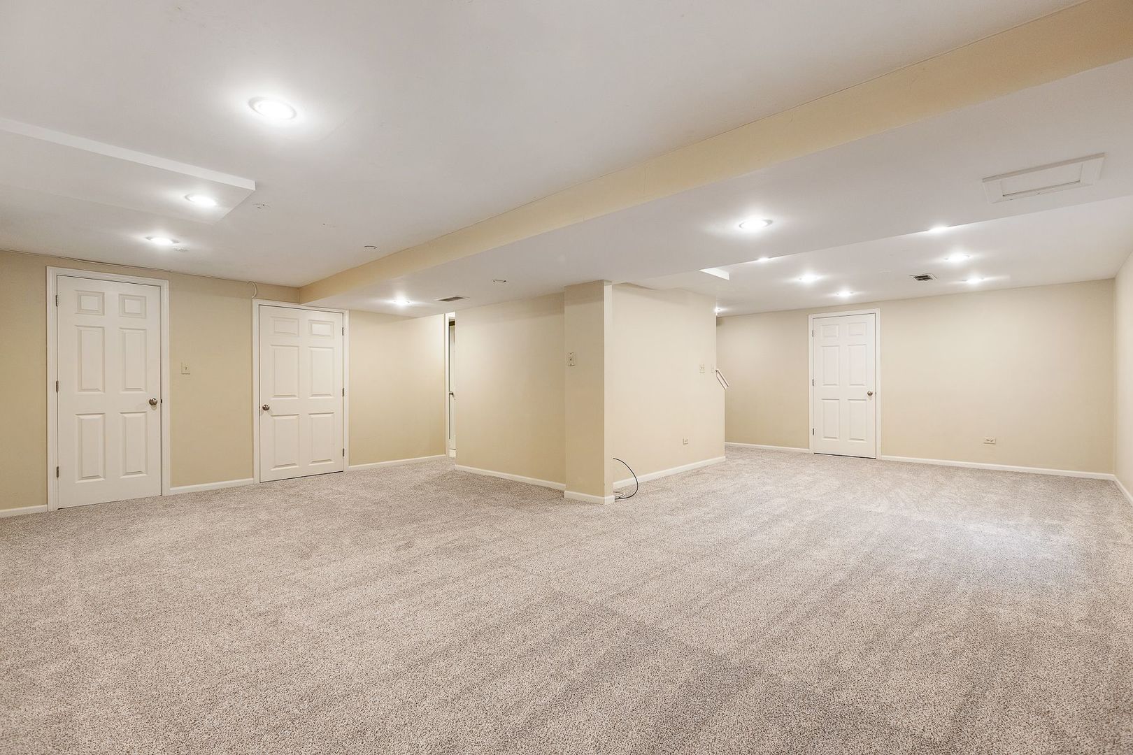 1540 West Wiesbrook Road Wheaton, IL 60189 - Photo 32 of 36 an empty room with an empty space and windows