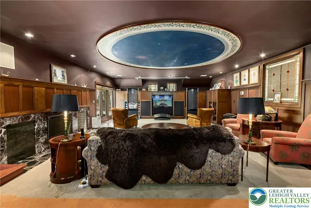 a bedroom with a bed and a flat screen television