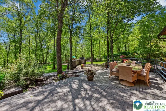 a porch with seating space and garden view