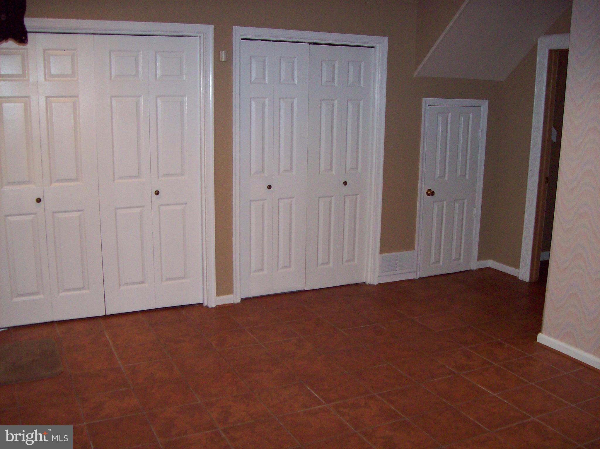 2128 Brigadier Boulevard Odenton, MD 21113 - Photo 5 of 24 Washer & Dryer behind family room closet